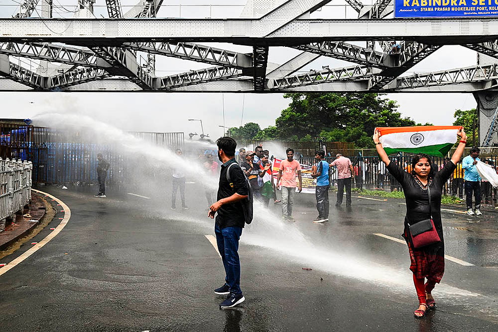 Kolkata Rape-Murder Case: Police use water cannons to disperse students - | Photo: PTI